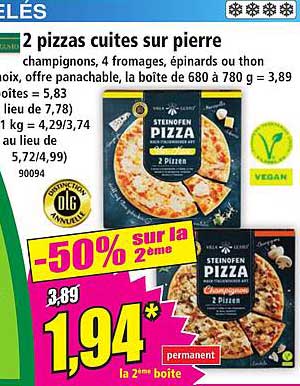 2 pizzas cuites sur pierre